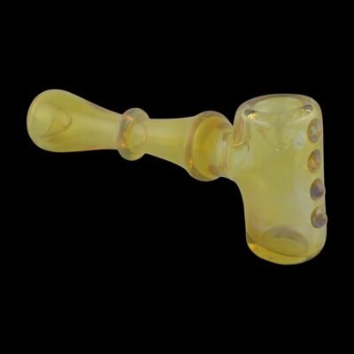 a yellow glass cob pipe